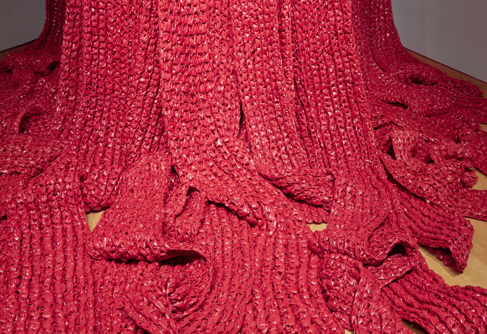 Akiko Kotani, Red Falls (detail), 2021. crocheted polyethylene, dimensions variable. Courtesy of the artist. Installation view of Skyway 20/21 exhibition at USF Contemporary Art Museum. Photo: Will Lytch.