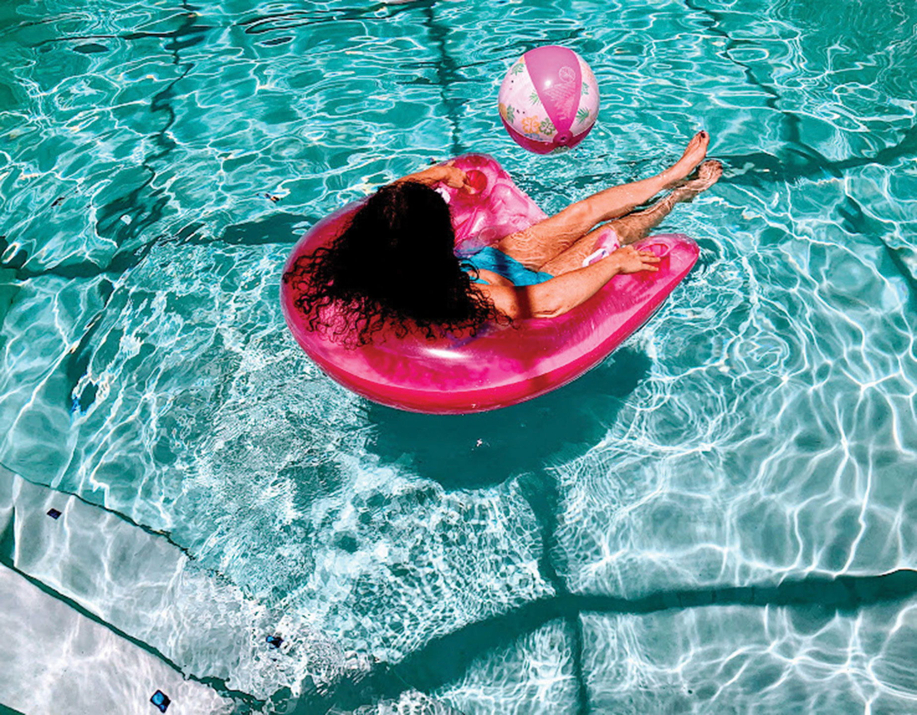 RaeAnne Swanson, Time in the Pink Pool Floatie, 2020. From the 2020 Breaking Barriers veterans photopraphy workshop.